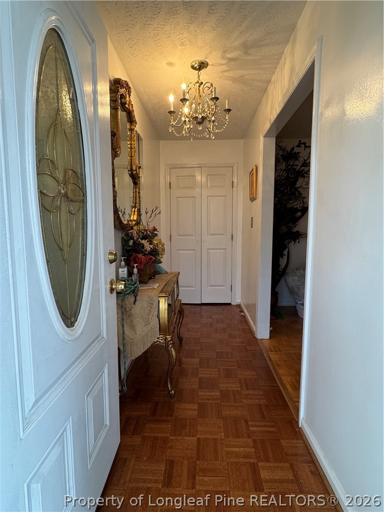 408 Old Farm Road Raeford, NC 28376 - Photo 9 of 27 a view of a hallway with washer and dryer