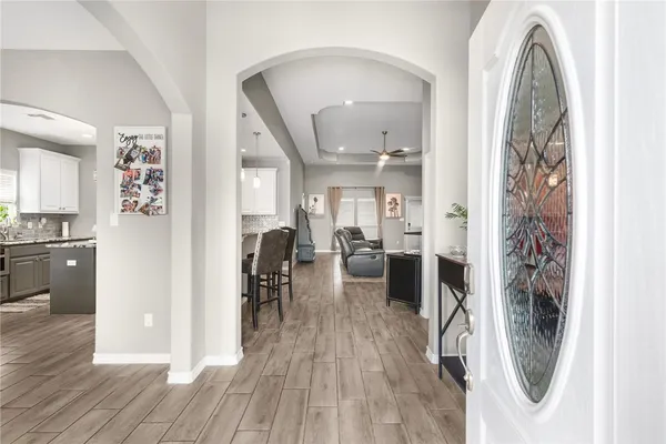 a view of a living room and dining room