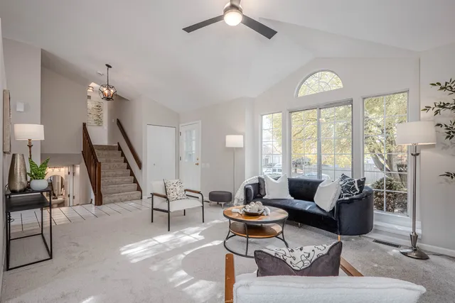 a view of a dining room with furniture window and outside view