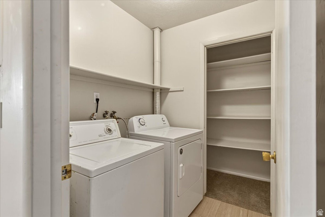 947 Canyon Road, Unit 29 Ogden, UT 84404 - Photo 18 of 19 Laundry area featuring independent washer and dryer
