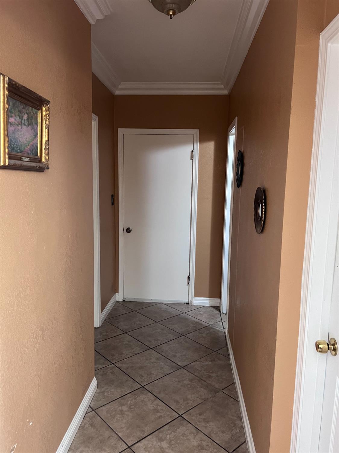 281 West Wilson Street Rialto, CA 92376 - Photo 7 of 15 a view of a hallway with wooden floor