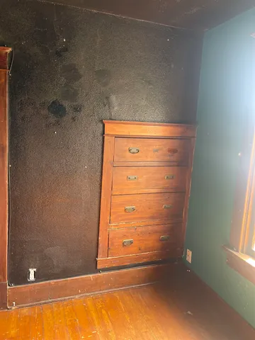 a view of a bathroom with mirror