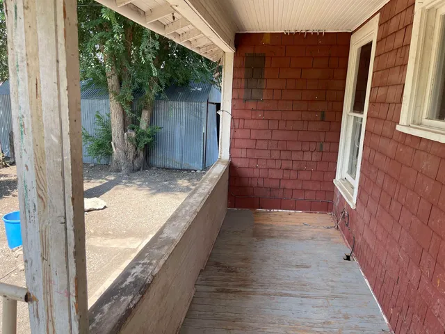 a close view of sink and cabinets