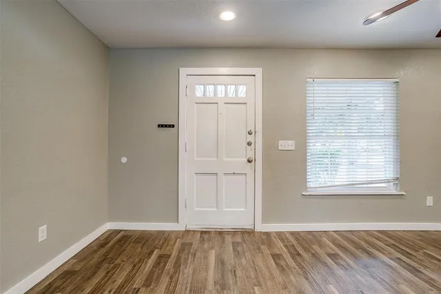 an empty room with window