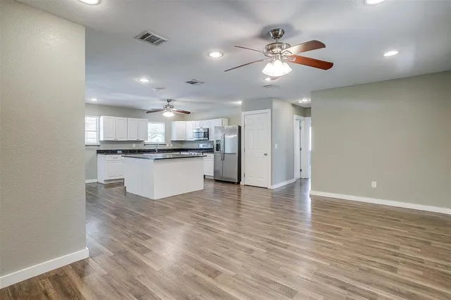 a swimming pool with wooden fence