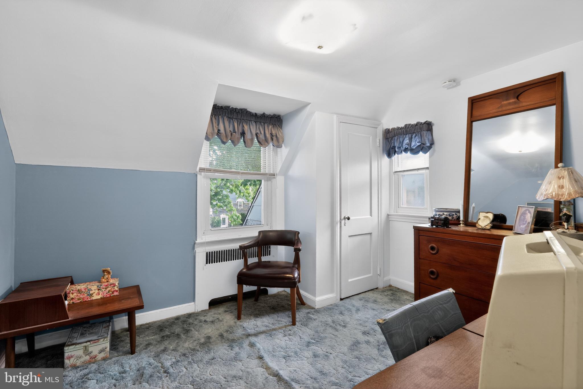 1424 Burmont Road Havertown, PA 19083 - Photo 25 of 37 a living room with furniture and a window