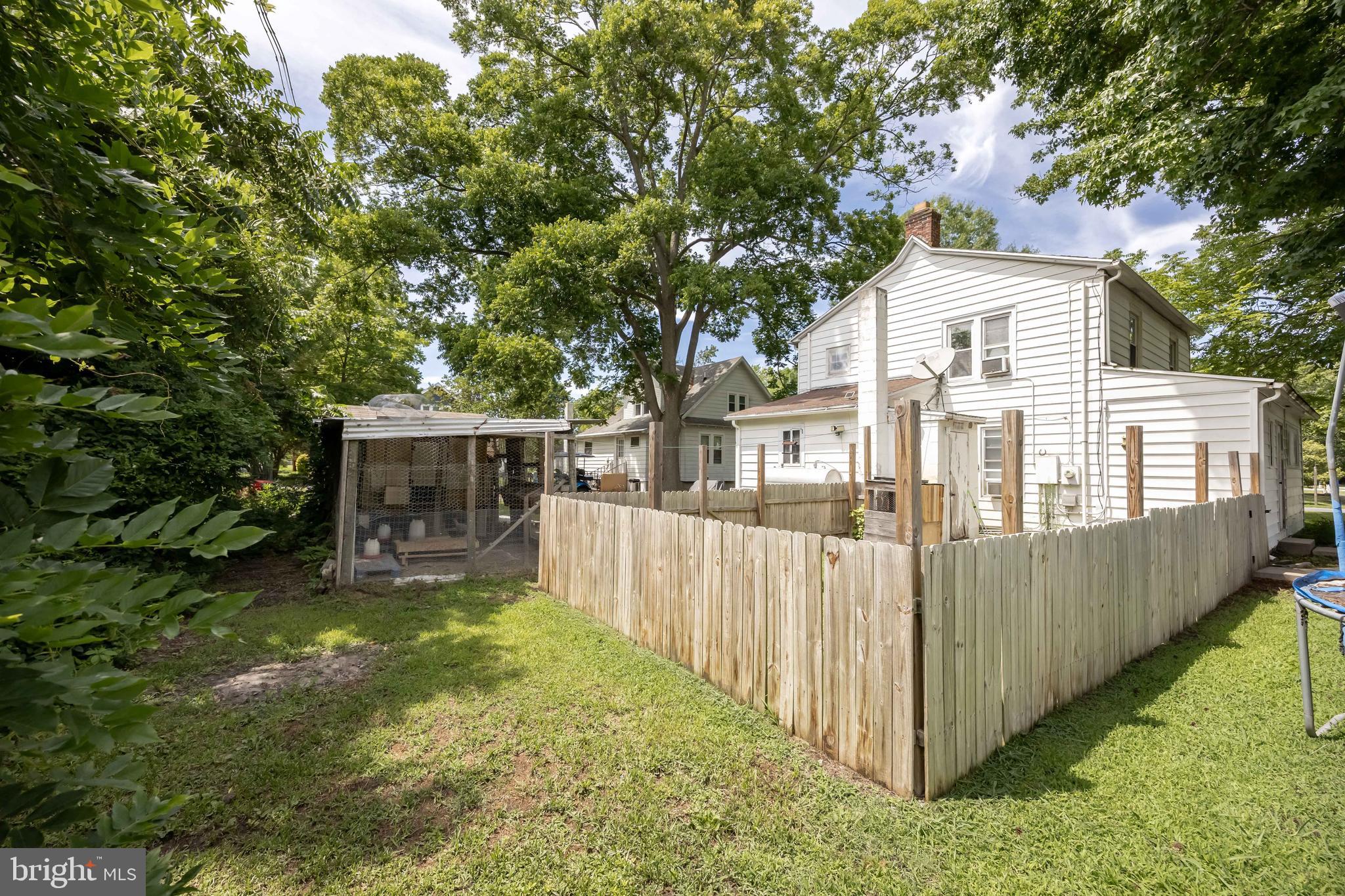 26467 Mariners Road Crisfield, MD 21817 - Photo 4 of 44 a view of a house with a yard