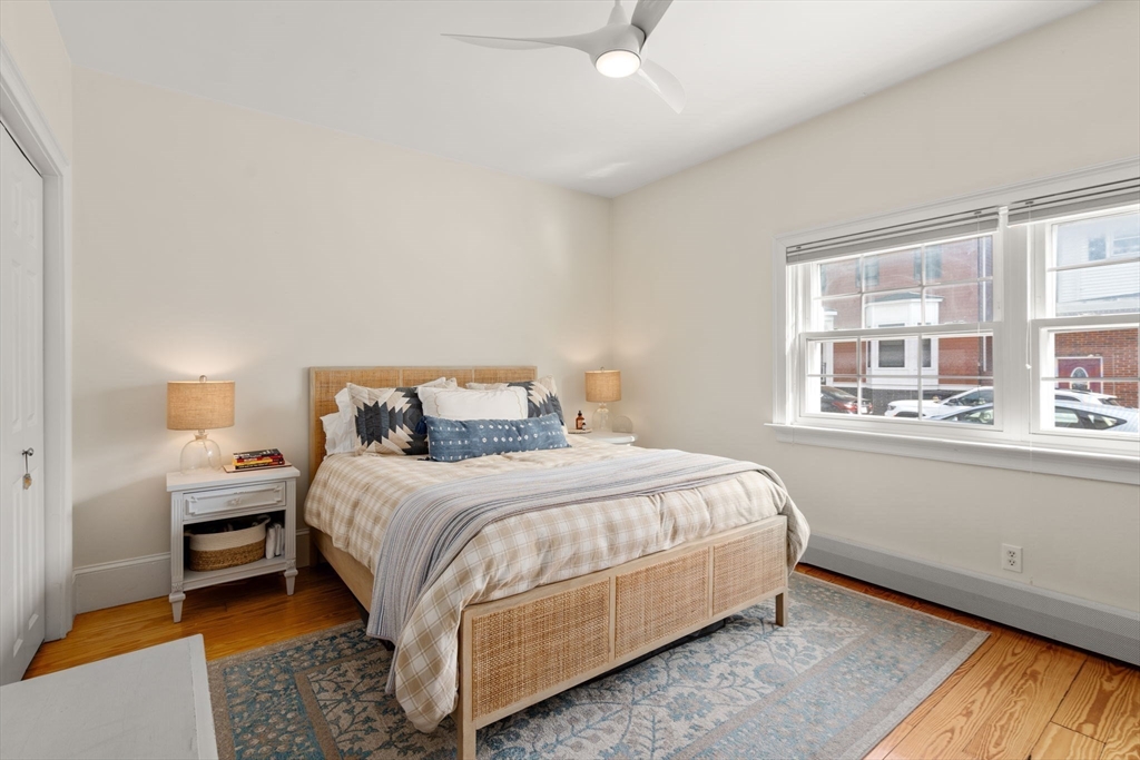 614 East 3rd Street, Unit 1 Boston, MA 02127 - Photo 12 of 23 a bedroom with a bed and a window