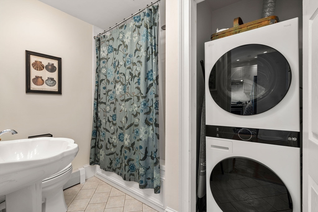 614 East 3rd Street, Unit 1 Boston, MA 02127 - Photo 14 of 23 a bathroom with a toilet and a sink
