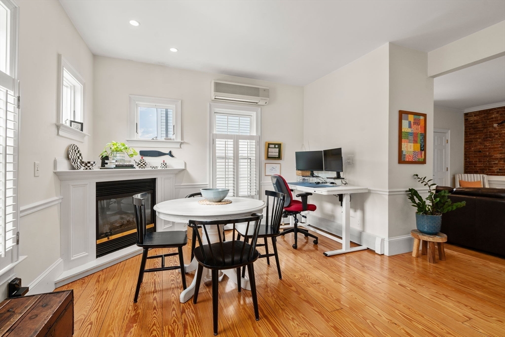 614 East 3rd Street, Unit 1 Boston, MA 02127 - Photo 6 of 23 a dining room with furniture and wooden floor