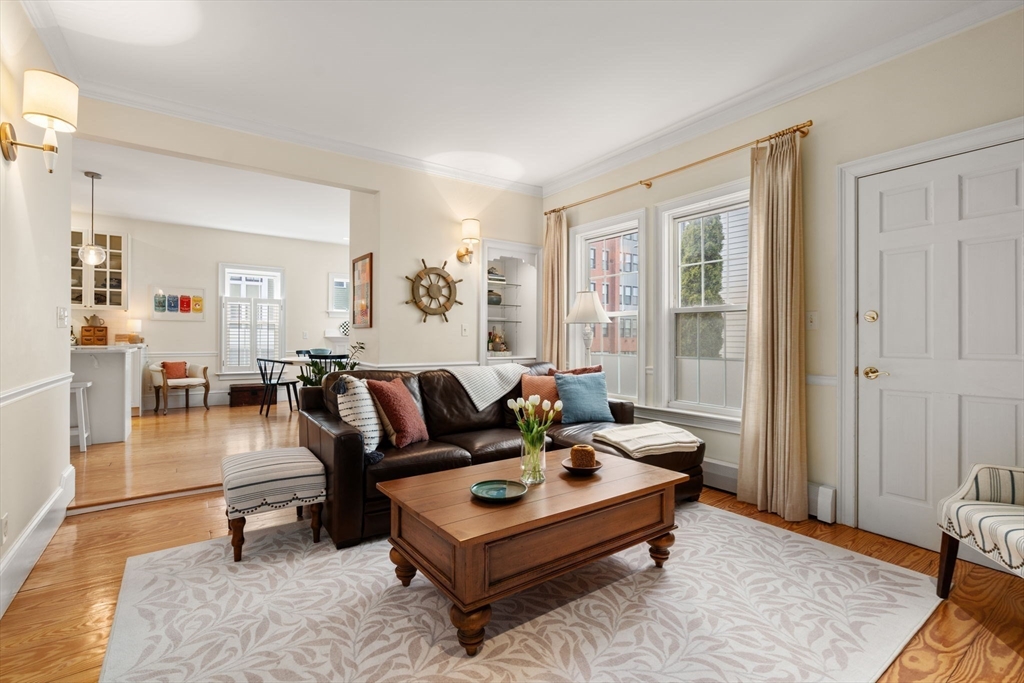614 East 3rd Street, Unit 1 Boston, MA 02127 - Photo 8 of 23 a living room with furniture and a table