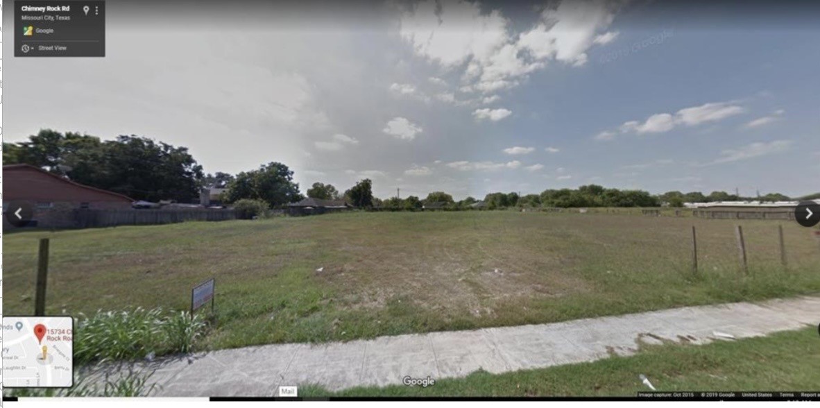 15734 Chimney Rock Road Houston, TX 77489 - Photo 3 of 6 a view of a lake from a yard