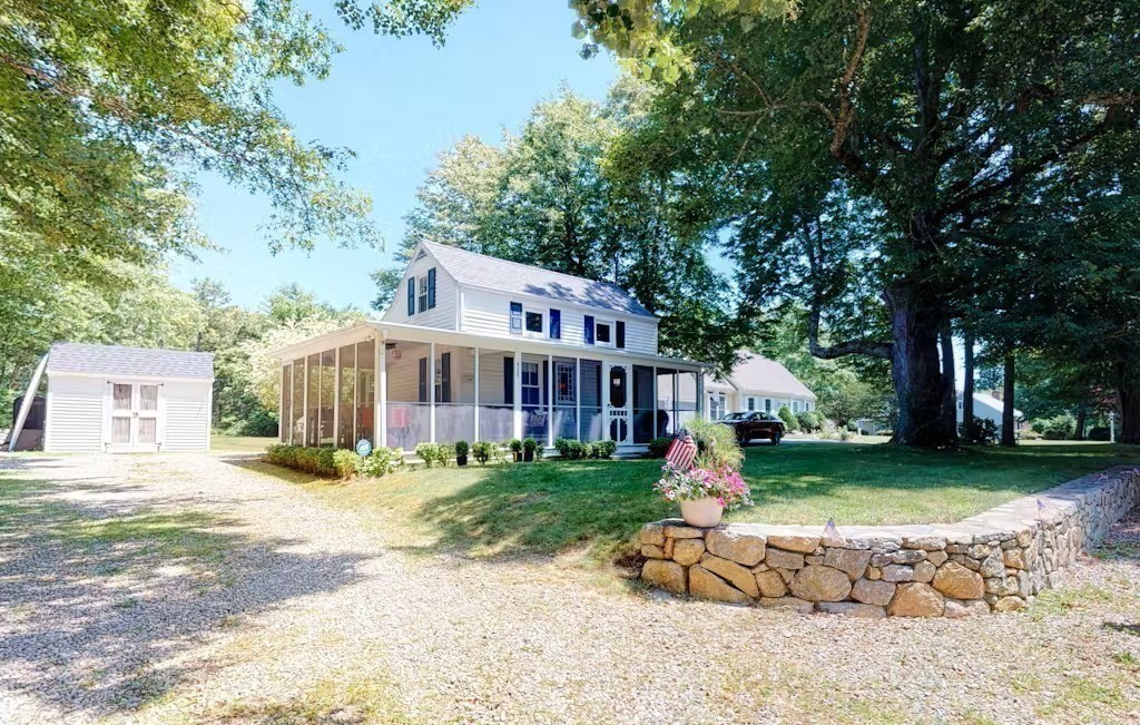 428 Main Street Barnstable, MA 02635 - Photo 2 of 27 a view of a house with backyard porch and sitting area