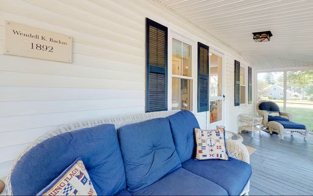 428 Main Street Barnstable, MA 02635 - Photo 26 of 27 a living room with furniture and a large window