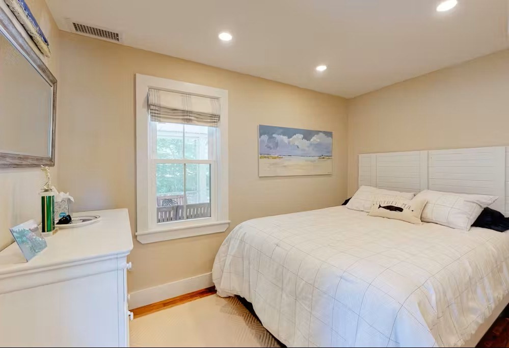 428 Main Street Barnstable, MA 02635 - Photo 27 of 27 a bedroom with a bed and a window