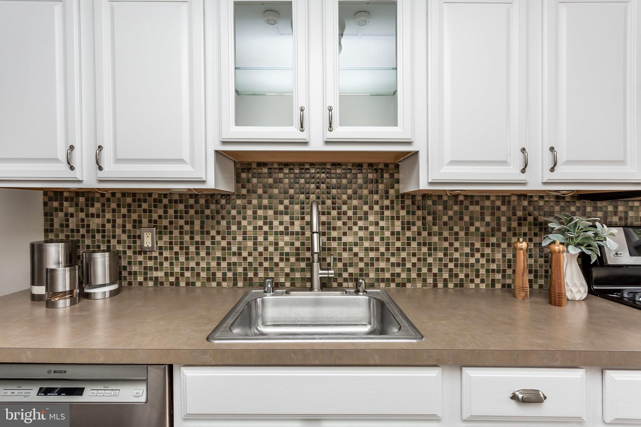 236 Stanmore Road Baltimore, MD 21212 - Photo 19 of 51 a kitchen with a sink and cabinets