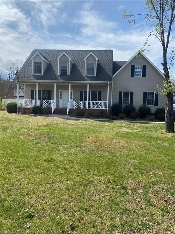 Rocking chair front porch, 2 level home on over an acre lot