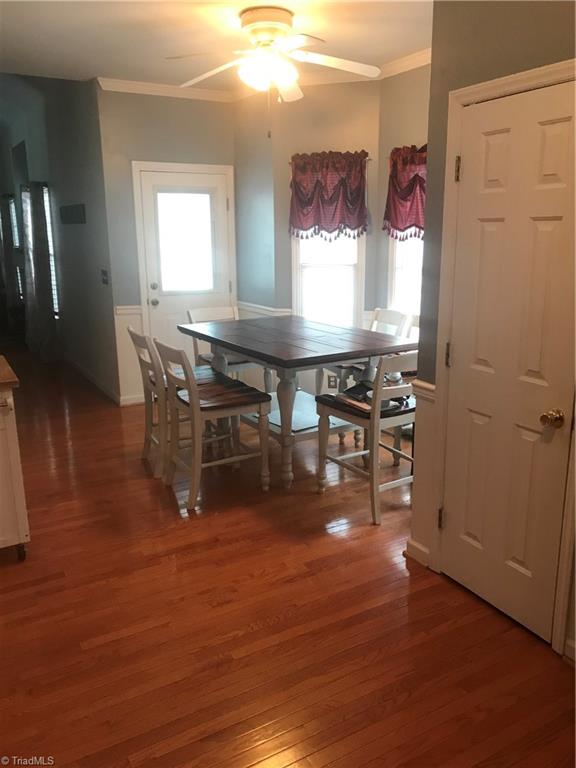 Entering through the garage right into kitchen/breakfast area. Lovely floors!