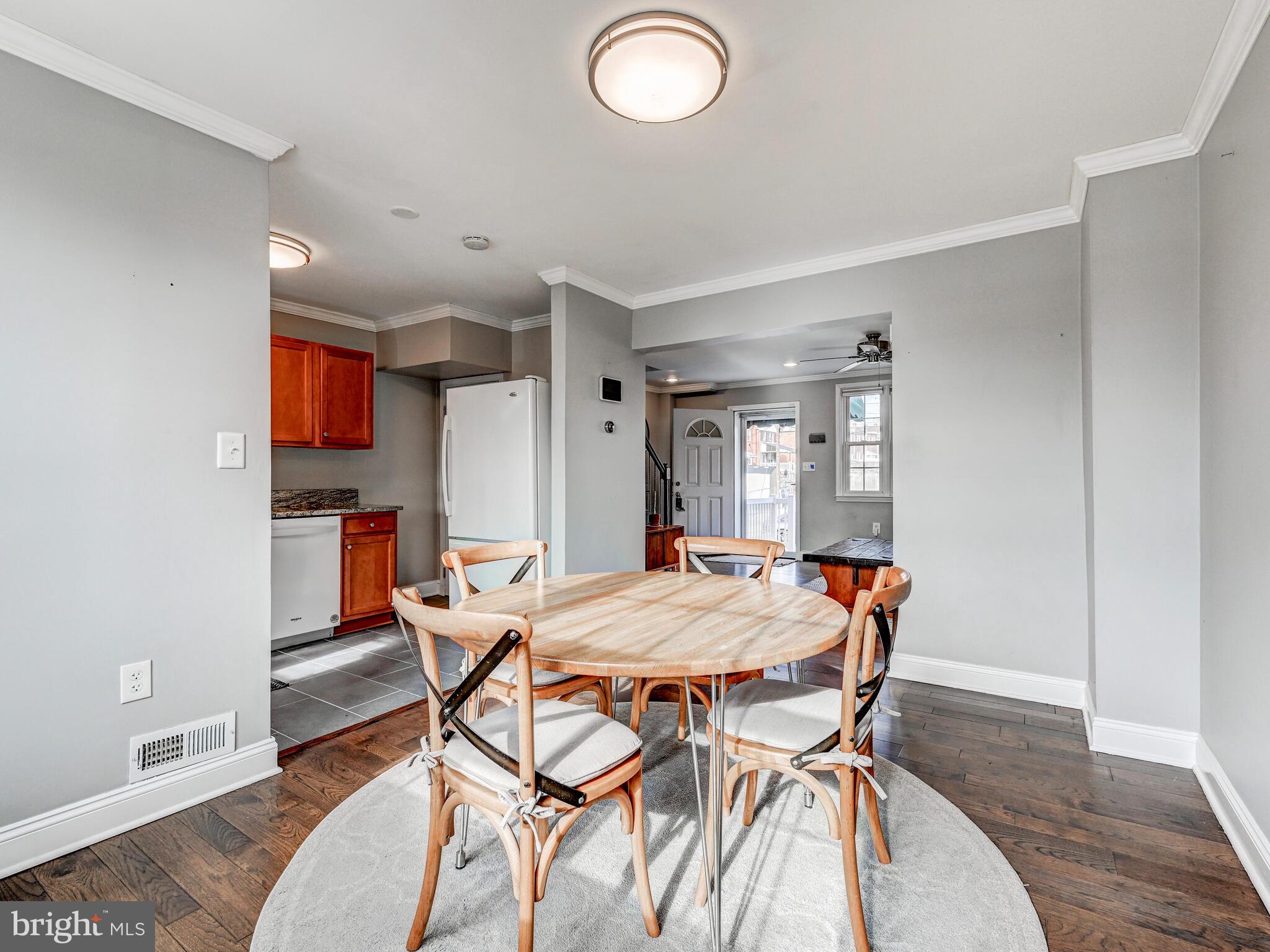 1507 Clearwood Road Parkville, MD 21234 - Photo 11 of 27 a dining room with furniture and window