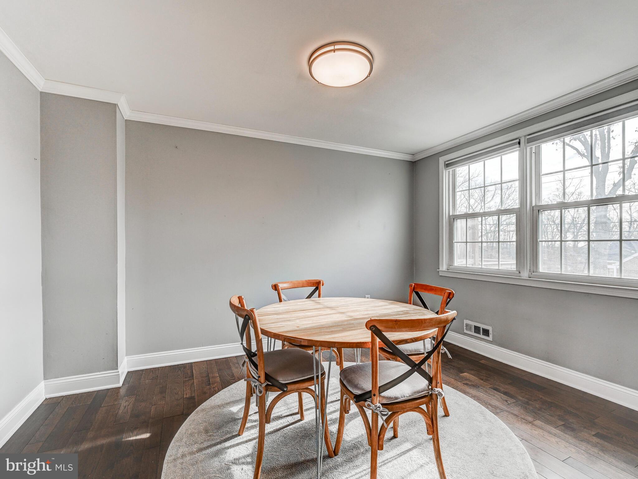 1507 Clearwood Road Parkville, MD 21234 - Photo 12 of 27 a dining room with furniture and a window