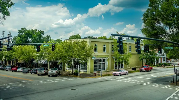 a view of a street with cars