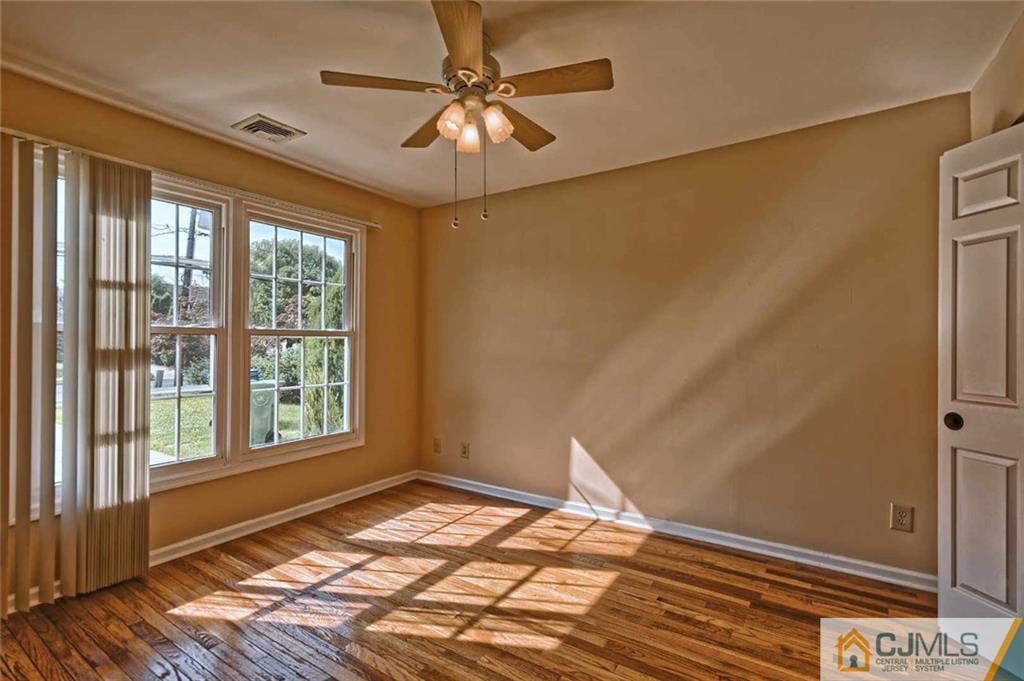 107 Brick Road Cherry Hill, NJ 08003 - Photo 14 of 18 a view of an empty room and window