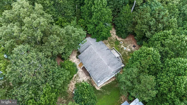 a picture of a room with a white wall and door