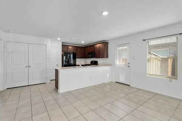 a view of kitchen with windows