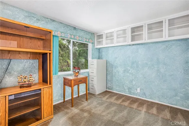 a view of a livingroom with furniture