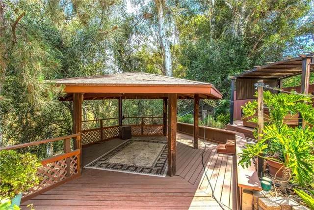 a view of a backyard with sitting area