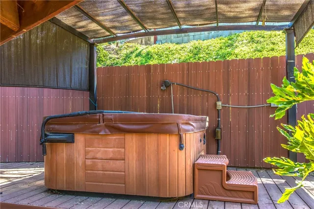 a picture of a park with a white wall