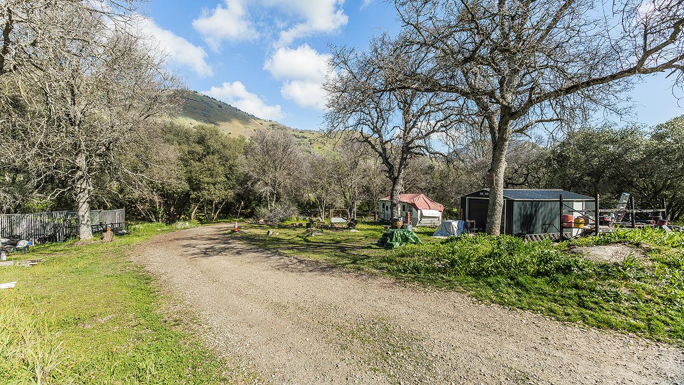 1321 Elwood Road Squaw Valley, CA 93675 - Photo 29 of 31 a backyard of a house with table and chairs