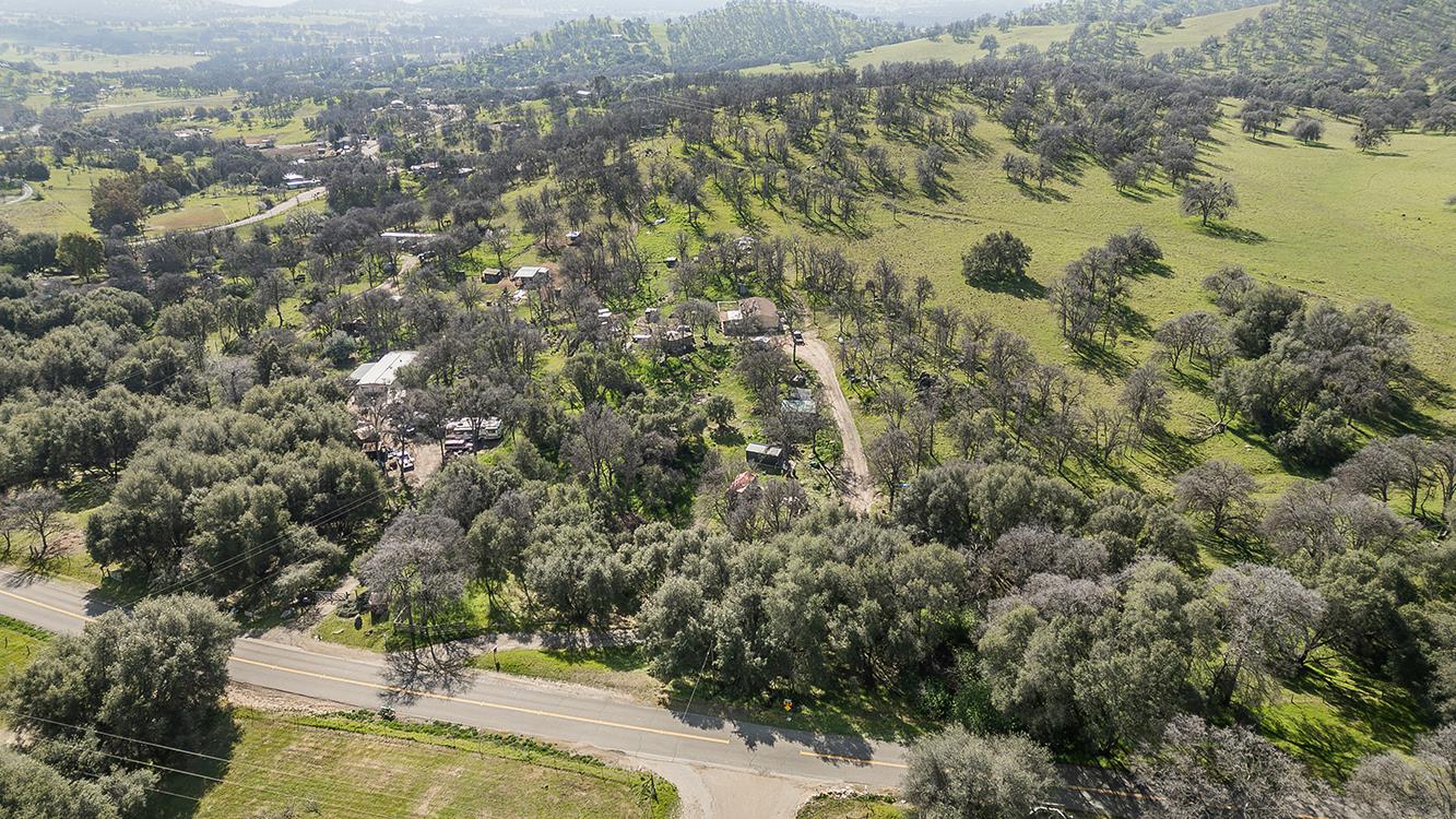 1321 Elwood Road Squaw Valley, CA 93675 - Photo 30 of 31 an aerial view of residential house with yard and lake view