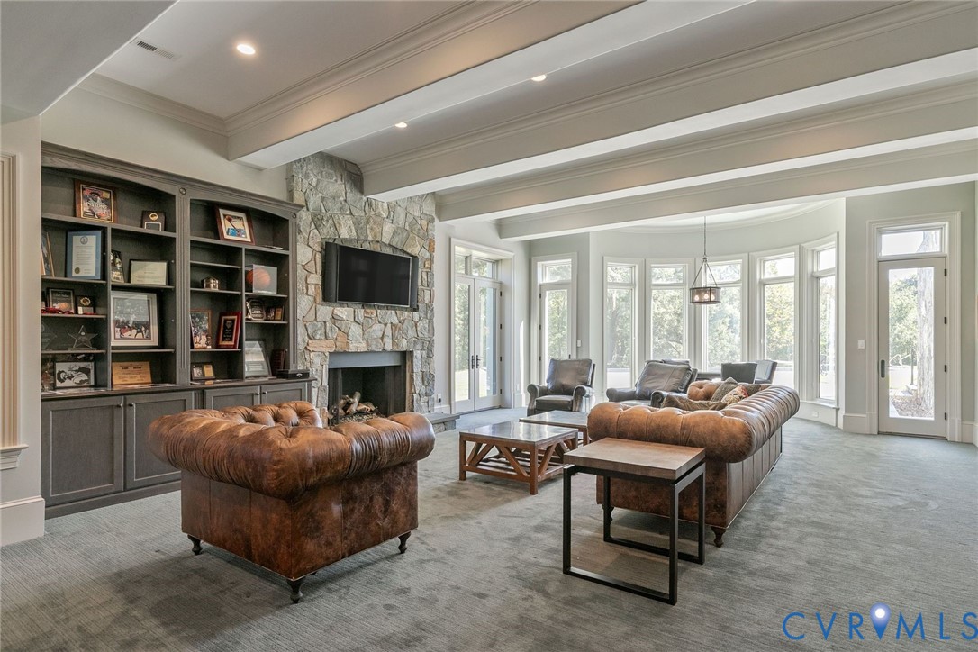 785 Oak Spring Lane Manakin-Sabot, VA 23103 - Photo 65 of 96 Spacious rec room with beams, stone gas fireplace,