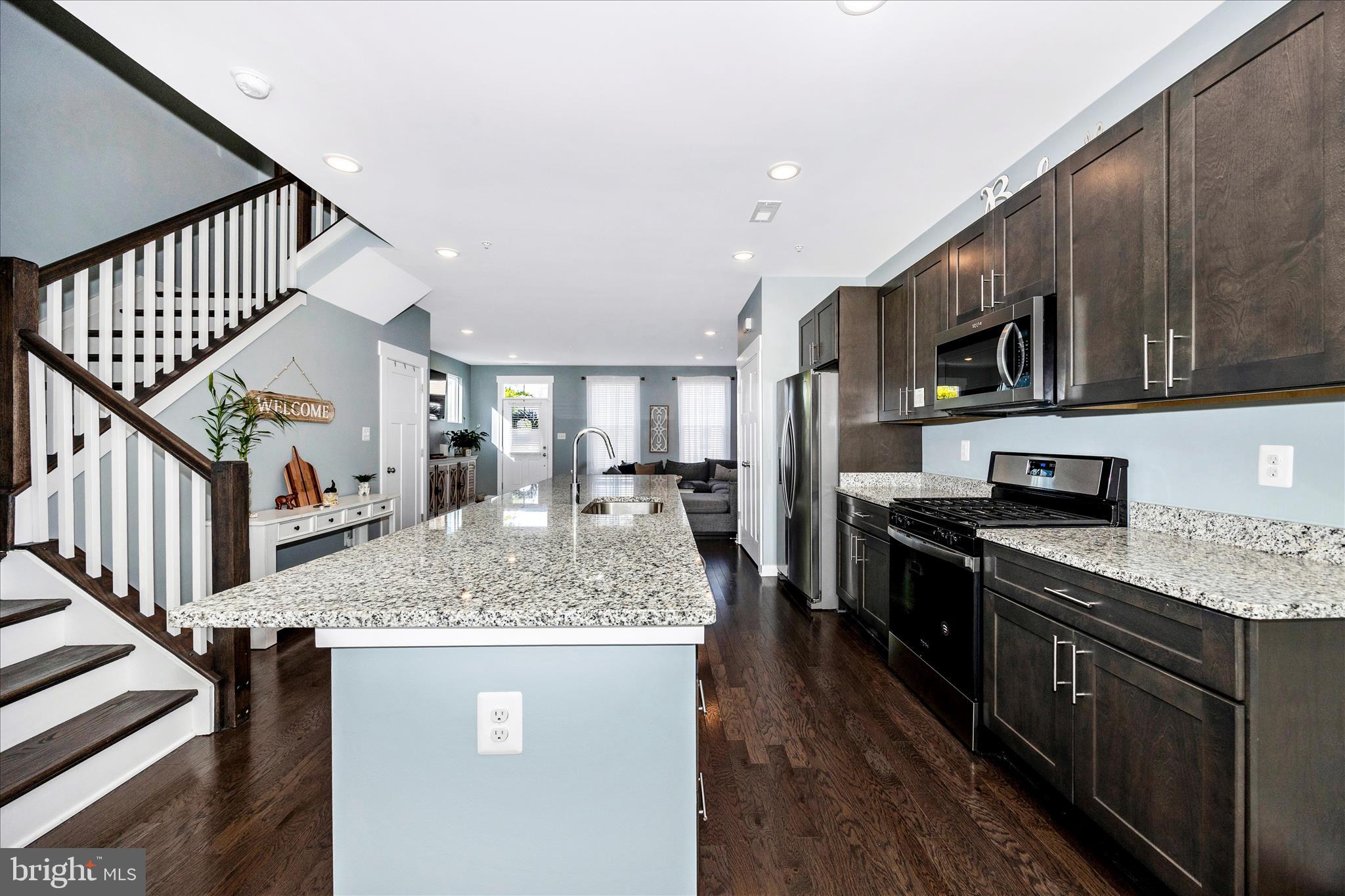 1314 Marsalis Place Frederick, MD 21702 - Photo 13 of 64 a kitchen with sink cabinets and stove