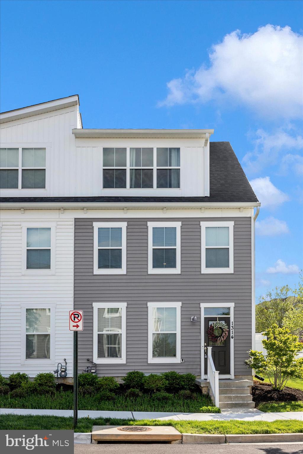 1314 Marsalis Place Frederick, MD 21702 - Photo 2 of 64 a front view of a house with a yard