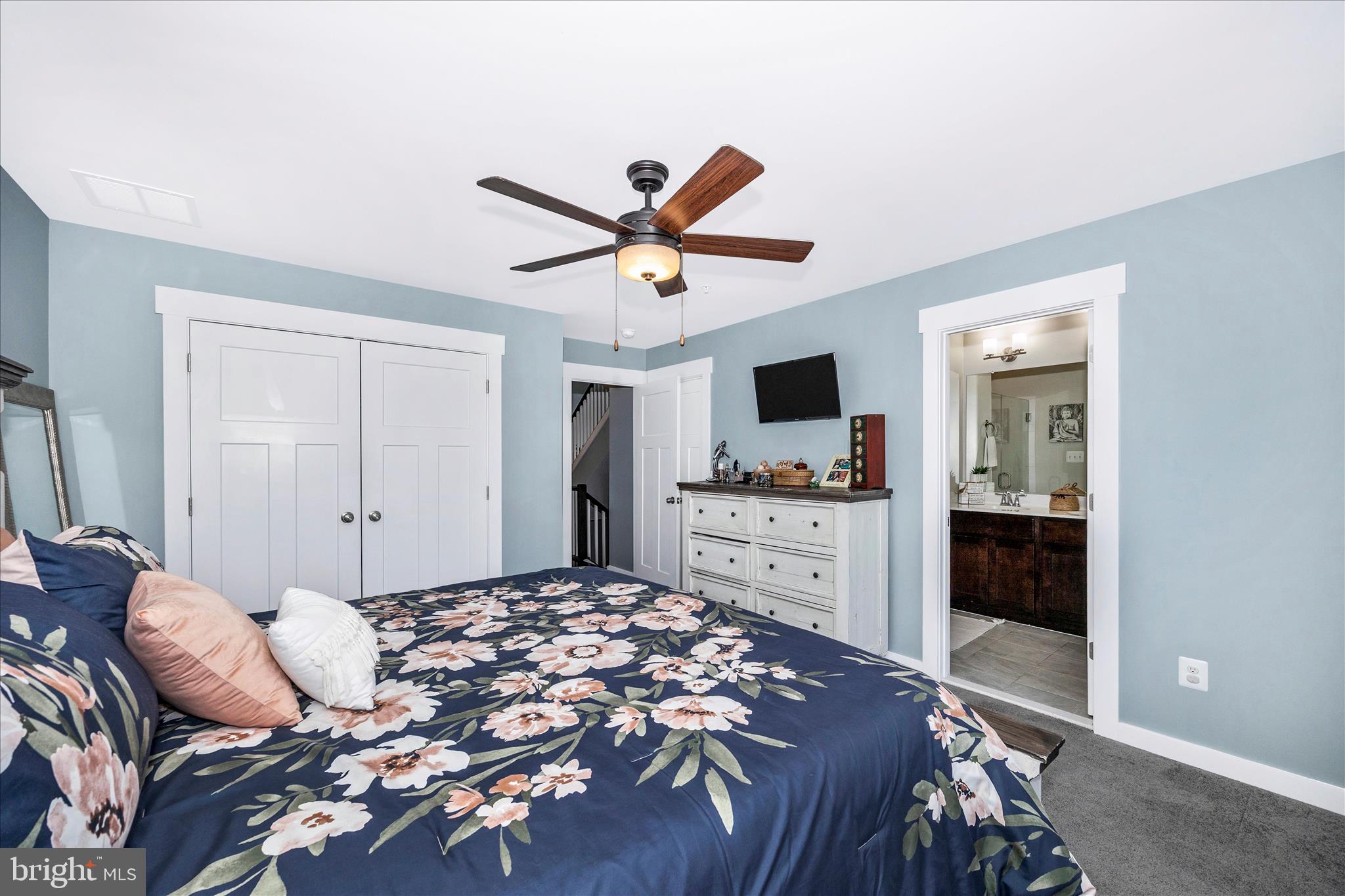 1314 Marsalis Place Frederick, MD 21702 - Photo 24 of 64 a bedroom with a bed and a television