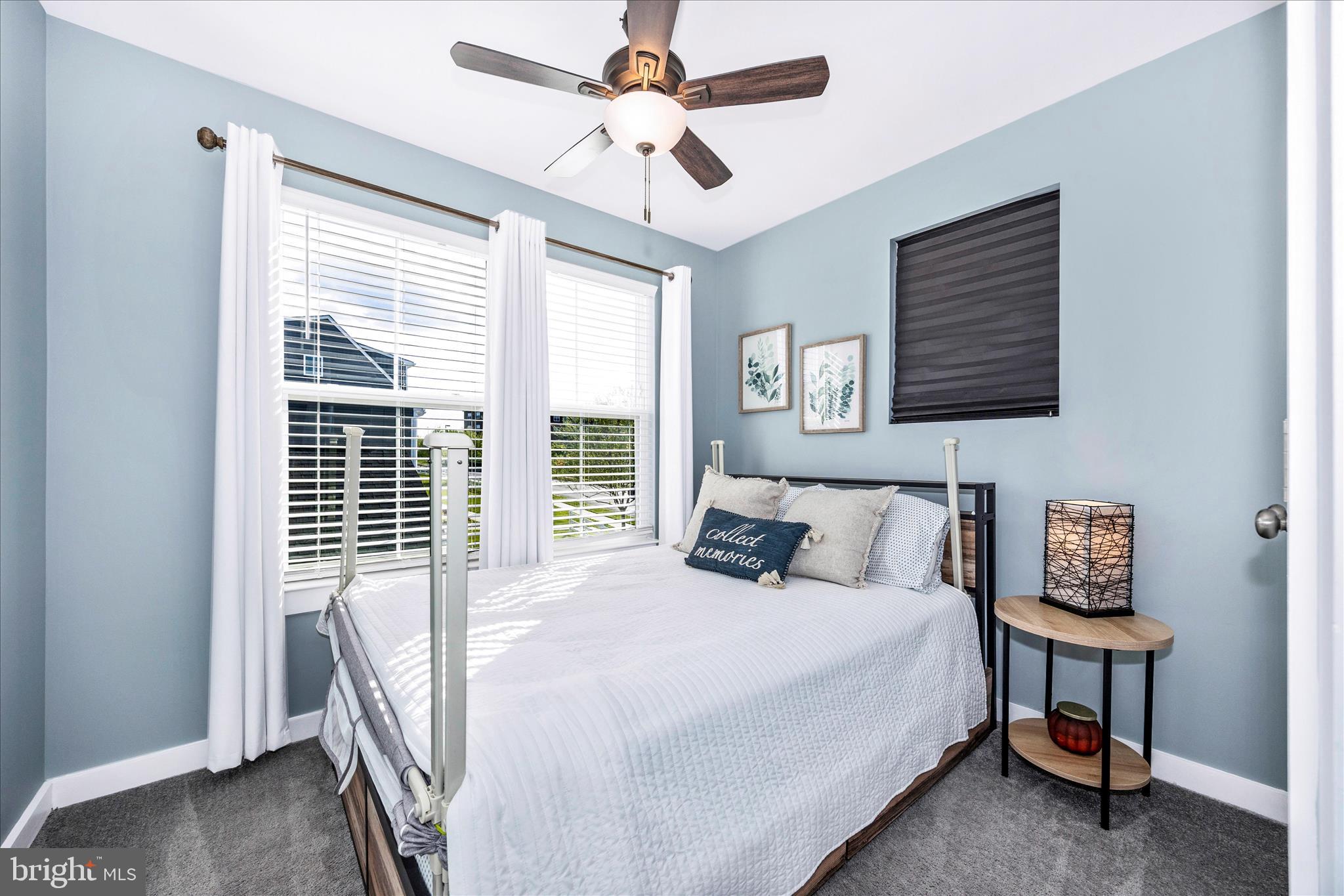 1314 Marsalis Place Frederick, MD 21702 - Photo 29 of 64 a bedroom with a bed and a table in it