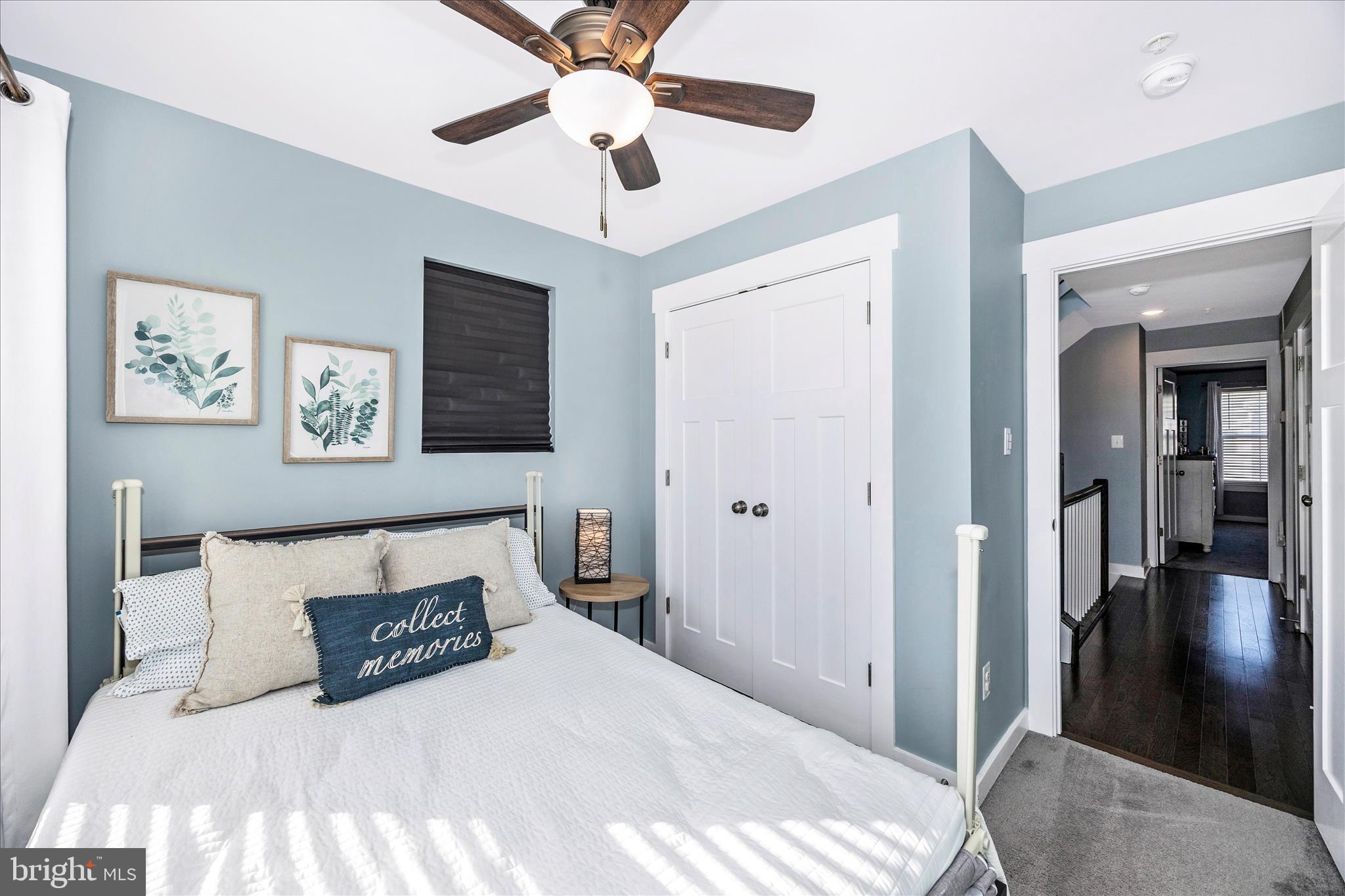 1314 Marsalis Place Frederick, MD 21702 - Photo 30 of 64 a bedroom with a bed and a chandelier