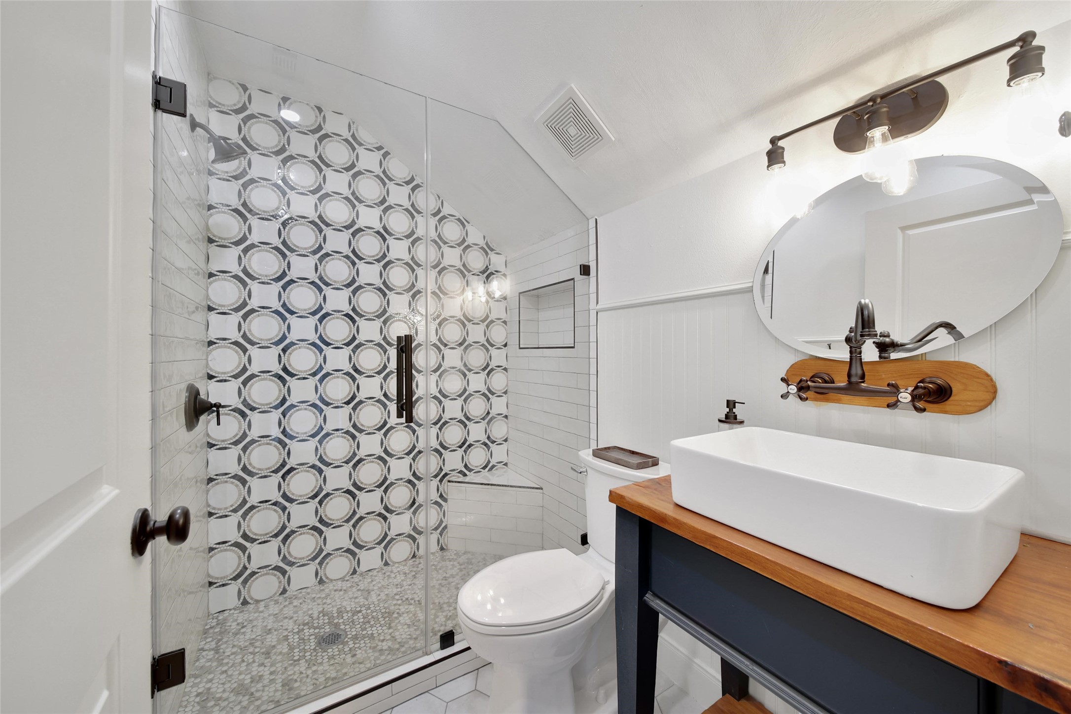18875 Rabon Chapel Road Montgomery, TX 77316 - Photo 30 of 45 a bathroom with a sink toilet and shower