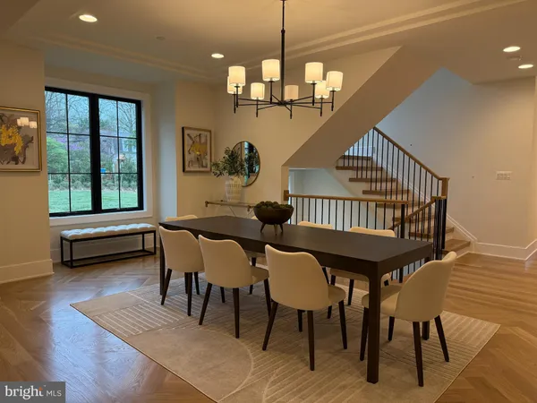 a living room with furniture window and wooden floor