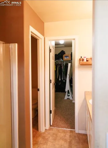 a view of a livingroom and a view of bedroom