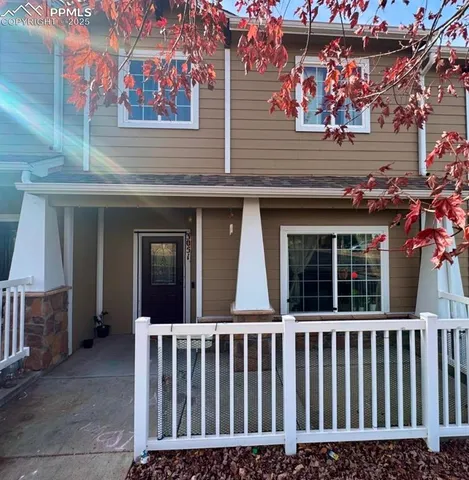 a view of a brick house with a small space