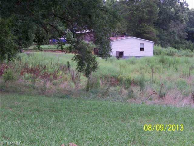 803 Chaney Road Asheboro, NC 27205 - Photo 10 of 12 Land. View from Backyard of 803 Chaney to side view of 761 Chaney - both located on one parcel but have separate driveways.