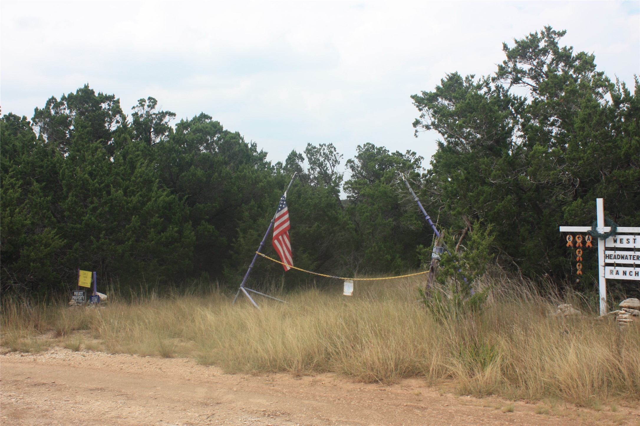 306 West Headwaters Ranch Road Kendalia, TX 78027 - Photo 3 of 9 Street view and entrance from W Headwaters Ranch.
