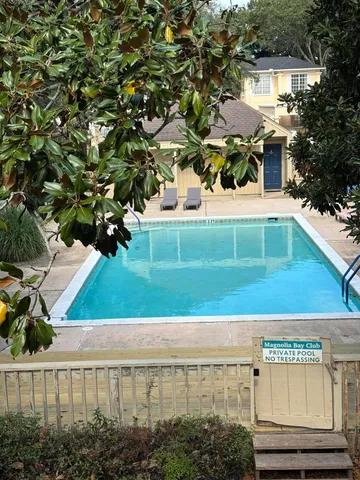 a view of a garden with a pathway