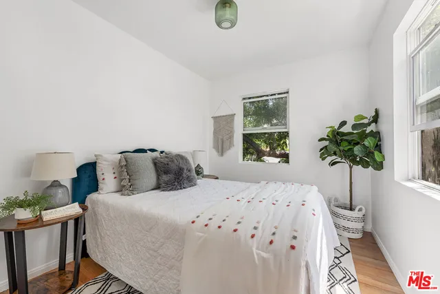 a view of a chair and table in the balcony