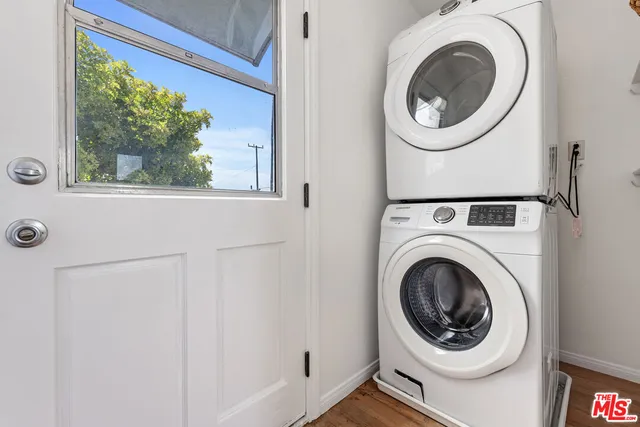 a outdoor living space with furniture and a potted plant