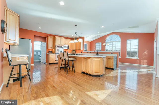 a spacious bathroom with a tub and shower