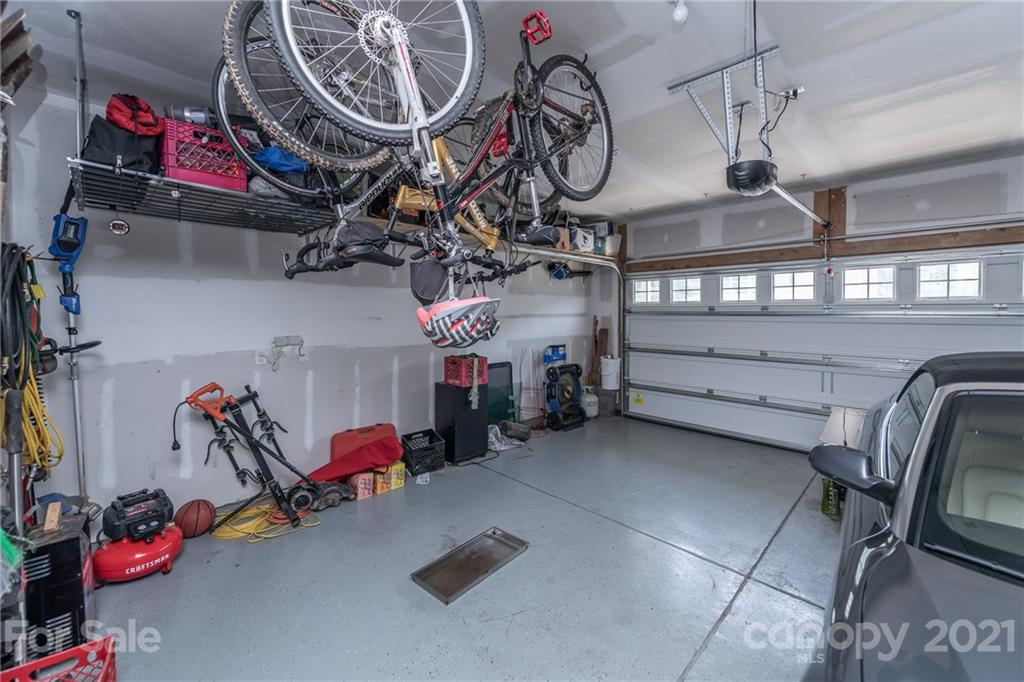 2142 Bluebell Way Tega Cay, SC 29708 - Photo 20 of 48 a view of a storage room with a lot of stuff